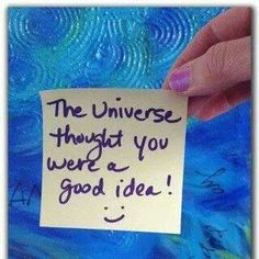 a hand holding a piece of paper that says the universe thought you were a good idea