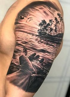 a man's arm with a ship and birds on it