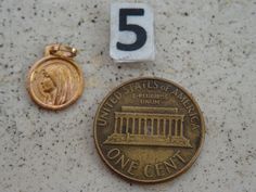 Religious antique French vermeil Catholic medal pendant of Holy Mary Our Lady of Notre Dame of Lourdes. On the medal : HOLY VIRGIN MARY. At the other side: The cave in Lourdes with Holy Mary and Saint Bernadette. Measures: 0,4 x 0,49 inches ( 1,03 x 1,25 cm ). I bought this medal on a brocante ( fleamarket ) in France. I have a lot of medals for sale. Please look at all of the pictures, as they complete the description. If you don't have paypal, you can pay by bank transfer. I deliver all over t Commemorative Coin Pendant, Saint Bernadette, Our Lady Of Sorrows, Cave In, Catholic Medals, Holy Mary, The Cave, Miraculous Medal, Bank Transfer