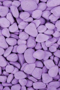 purple rocks are piled together in a pile