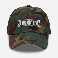 "An awesome camouflage print JROTC hat perfect for Junior ROTC Cadets and their friends and family. Makes a great gift for showing off your love for JROTC with pride. This is a great quality hat with an embroidered JROTC logo- not a cheap print like my competitors put out. This one's got a low profile with an adjustable strap and curved visor. * 100% chino cotton twill * Unstructured, 6-panel, low-profile * 3 ⅛\" crown * Adjustable strap with antique buckle * Head circumference: 20 ½\" - 21 ⅝\"" Emerald Isle North Carolina, Different Hat Styles, Camo Hat, Dads Favorite, Different Hats, Favorite Son, Camo Hats, Moms Favorite, Camo Colors