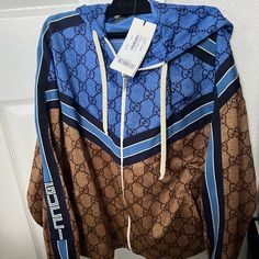 Brand New Gucci Oversized Track Jacket, Size Xs, Tags Attached. Blue Gucci Winter Outerwear, Designer Brown Gucci Outerwear, Designer Blue Gucci Outerwear, Blue Designer Gucci Outerwear, Casual Blue Gucci Outerwear, Gucci Jackets, Gucci Jacket, Track Jacket, Track Jackets