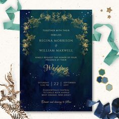 a wedding card with blue and gold foil on it