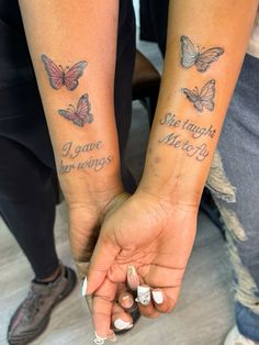 two people holding hands with butterfly tattoos on their arms and the words i love you always