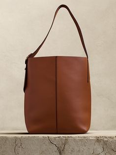 Vida Bag | Banana Republic Saddle Brown, Signature Hardware, Leather Bag Women, Leather Bucket Bag, Leather Bucket, Leather Pieces, Dark Gold, Leather Belts, Classic Leather