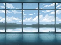 an empty room with large windows looking out onto the water and mountains in the distance