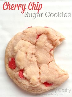 a close up of a cookie on a white paper with the words cherry chip sugar cookies