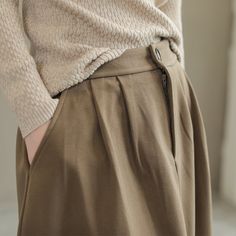 Details: Gender: Women Item Type: Skirt Material: Wool Season: Spring, Autumn Pattern: Solid Style: Casual, Loose, Retro Waist Type: Elastic Waist Size: One Size Waist: 64.00 - 84.00 cm/ 25.20 - 33.07 " Length: 77.00 cm/ 30.31 " Hip: 126.00 cm/ 49.61 " Hem: 184.00 cm/ 72.44 " Casual Solid Color Winter Pleated Skirt, Fall Mini Skirt In Solid Color, Non-stretch Winter Midi Skirt, High Waist Pleated Skirt For Winter, Winter Wide-leg Solid Color Skirt, Winter Wide Leg Solid Color Skirt, Workwear Solid Color Skirt, Fall Long Khaki Skirt, Fall Pleated Khaki Bottoms