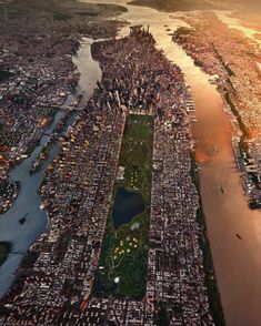 an aerial view of a city and river