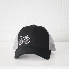 VITAL BICYCLE Mesh Back Cap Low Profile Black and Gray Adjustable Trucker Hat With Curved Visor, Black Trucker Hat With Mesh Back, Black Trucker Hat With Mesh Back And Curved Visor, Black Trucker Hat With Curved Visor, Adjustable Trucker Hat For Sports, Black Trucker Hat For Outdoor Activities, Black Trucker Hat With Visor For Outdoor Activities, Breathable Trucker Hat With Curved Visor, Helmet Hair