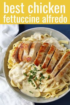 chicken fettuccine alfredo in a white bowl