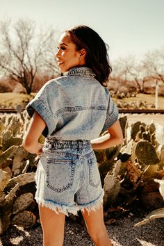 Our Distressed Denim Romper is perfect for all your summer concerts! This short sleeve light wash romper has an elastic waist and distressing in all the right places. Wear it with your favorite boots for the perfect summer-y cowgirl outfit! Light Wash Casual Jumpsuits And Rompers, Casual Light Wash Denim Jumpsuit With Short Sleeves, Casual Light Wash Short Sleeve Jumpsuits And Rompers, Casual Light-wash Jumpsuit With Short Sleeves, Spring Distressed Medium Wash Jumpsuits And Rompers, Spring Medium Wash Distressed Jumpsuits And Rompers, Relaxed Fit Denim Jumpsuit With Short Sleeves, Relaxed Fit Short Sleeve Denim Jumpsuit For Day Out, Medium Wash Short Sleeve Jumpsuits And Rompers For Spring