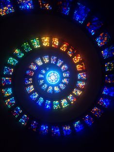 the inside of a colorful stained glass window