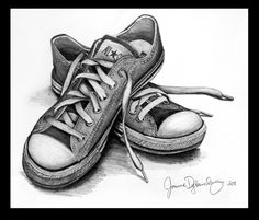 a pencil drawing of two shoes on the ground