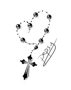 a cross and some beads on a white background