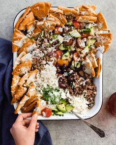 a platter filled with lots of different types of food