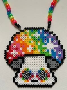 a colorful beaded necklace with a skull on it