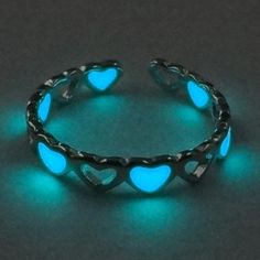 Our Glow in the Dark Ring will definitely go perfectly with your daily attire whether it is casual or formal. This is perfect for you, or as a gift for a loved one. Limited stock, get yours before they're gone Product details: Materials: Zinc Alloy Size: Adjustable Due to extremely high demand, please allow 3-5 weeks for your product arrive (just to be safe!). Unhappy With Your Product? We’ll Take It Back! We stand by our high-quality product and ensure your satisfaction is 100% guaranteed. Silver Glow In The Dark Jewelry For Party, Silver Glow-in-the-dark Jewelry For Party, Luminous Jewelry For Gift, Trendy Rings For Valentine's Day Party, Trendy Party Rings For Valentine's Day, Luminous Jewelry For Valentine's Day Gift, Trendy Luminous Jewelry For Gifts, Valentine's Day Luminous Jewelry Gift, Luminous Ring Jewelry As A Gift