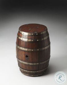 a wooden barrel sitting on top of a table