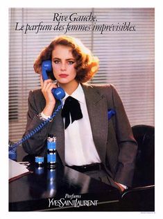 Power suits often featuring a sharp, tailored blazer and trousers, often worn with a white blouse and statement jewelry. The power suit was a symbol of success and authority for younger women. Parfum Ads, Rive Gauche Perfume, Perfume Adverts, Firmin Didot, 2025 Aesthetic, Perfume Ads