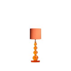 an orange lamp on a white background