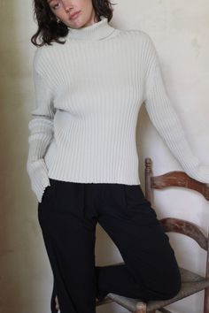 The Montana Pima Cotton Turtleneck boasts a traditional rib design that will serve as a staple in your wardrobe. Crafted with longevity in mind, this turtleneck is made a warm and durable ribbed fabric, ensuring a timeless and sophisticated look. Classic Ribbed Sweater For Spring, Classic Ribbed Spring Sweater, Classic Ribbed Turtleneck For Spring, Classic Stretch Sweater With Ribbed Neckline, Classic Spring Turtleneck With Ribbed Collar, Classic Ribbed Collar Turtleneck For Spring, Classic Turtleneck With Ribbed Collar For Spring, Fitted Funnel Neck Sweater With Ribbed Neckline, Classic Spring Turtleneck Sweater