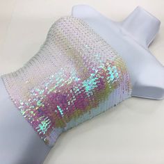 Strapless Sequined Fitted Tube Top, Fitted Sequin Strapless Tube Top, Glamorous Strapless Stretch Tube Top, Glamorous Stretch Strapless Tube Top, Glamorous Sequined Summer Tube Top, Glamorous Sequined Tube Top For Summer, Sequin Bandeau Top For Party, Summer Sequined Bandeau Tops, Sequin Bandeau Top For Summer