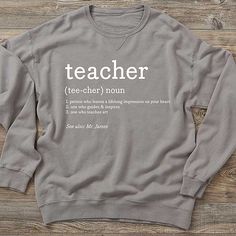 Personalized with any name along with any pronunciationCreate any definition up to 5 lines  Our Definition of Teacher Personalized Adult Sweatshirt lets them display what it means to be a teacher. Personalized Casual Tops For Teacher Appreciation, Casual Customizable Sweatshirt For School, Personalized Crew Neck Top For College, Casual Tops With Custom Text For School, Casual School Tops With Custom Text, Personalized Sweatshirts, Teacher Personalized, Teacher Tees, Teacher Name