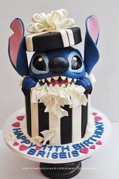 a birthday cake with a cartoon character on it