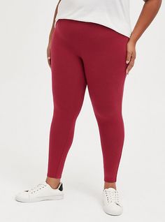 FIT Model is 5'10” wearing size 1. . High rise. Comfort waist: A narrower 1” waistband that sits perfectly against your curves for an easier less restrictive fit. Tapered leg. Full length. 27” inseam. MATERIALS + CARE Jersey knit fabric. 95% cotton, 5% spandex. Wash cold. Dry low. Imported. DETAILS Opaque - never see through. WHY WE LOVE IT These ultra-comfy leggings are designed with a narrower waistband while still keeping you sleek and streamlined. . The best plus size women's full length com Black Leggins, Premium Leggings, Comfy Leggings, Red Leggings, Best Leggings, Under Dress, Tapered Pants, Matches Fashion, Jersey Knit Fabric