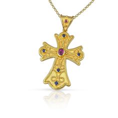 "The beauty of Byzantine style jewelry, completely handcrafted in Greece with the old-fashioned way, is omnipresent. An outstanding solid yellow gold cross with Byzantine design decorated with genuine gemstones, remains a classic and elegant choice for everyone. Bold and traditional, you will not take your eyes over your finger. Neither will your friends! High Quality Handmade Greek jewelry! ✔ High quality product. ✔ In a gift box ✔ Ready to Ship in 5-10 Business Days ✔ Made to Order ✔ Unique pe Byzantine Style Historical Wedding Jewelry, Byzantine Cross Jewelry For Ceremonial Occasions, Byzantine Cross, Cross Gold, Orthodox Cross, Filigree Jewelry, Greek Jewelry, Pink Sugar, Ruby Sapphire