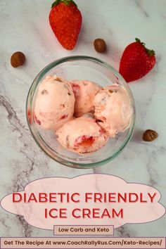 a bowl filled with ice cream next to two strawberries