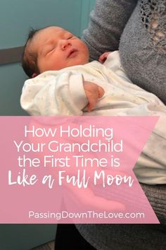 a woman holding a baby in her arms with the words how holding your grandchild the first time is like a full moon