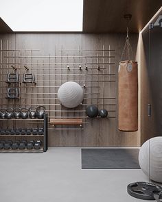 an exercise room is shown in this modern style home with wood paneling and metal accents