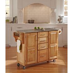 a kitchen island with two wine bottles on it