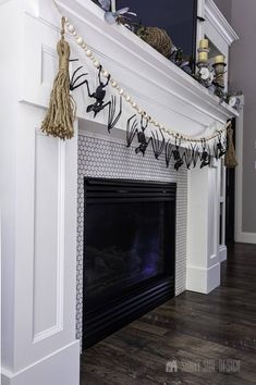 a fireplace with decorations on the mantle