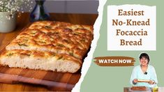 an image of bread on a cutting board with the words easy no - knead focaccia bread