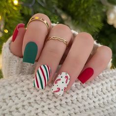 PRICES MAY VARY. 🎅【Christmas False Nails】All the acrylic false nail tips features Christmas symbols, like snowflakes, reindeer, Christmas tree, ball, and the traditional color of red, green and white. The adorable design and classic match color can be matched with any Christmas party outfit that surely give you a Christmas season cheerful this year! 🎄【High-Quality Press On Nail Kit】You will get 24 pcs fake nails and 1 mini nail glue, 12 sizes(0-11 on the back), short false nails for your everyday needs to get beautiful fast, make yourself a nail art in few minutes. 🦌【Sturdy & Durable】Short press on nails are made of quality acrylic, which are environmental protection, non-toxic, no smell, and gentle to your nails and skin. The nails with moderate thickness are not easy to break, will no Candy Cane Nails, Red Christmas Nails, Short Square Nails, Nail Art Set, Nail Candy, Diy Nail Art