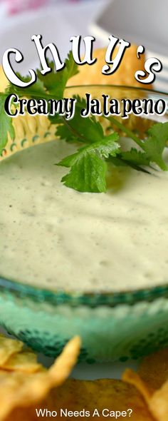 a plate with chips on it and the words chuy's creamy jalapeno