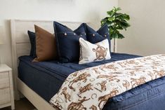 Dark blue zipper bedding with matching and brown leather pillows. Matching sheriff cowboy pillow and blanket Western Boys Room, Bedding Navy, Western Boys, Girls Bunk Beds, Zipper Bedding, Satin Pillowcase, Feather Pillows, Dark Blue Denim, Make Your Bed