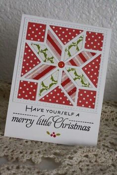 a christmas card with an ornament on it