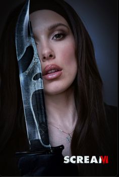 a woman holding a knife in front of her face with the words scream on it