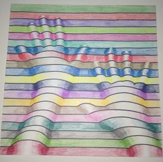 an image of a drawing with colored pencils on the bottom and top of it