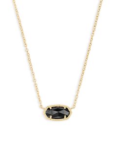 A dainty stone and delicate metallic chain combine to create the Elisa Gold Pendant Necklace in Black, your new favorite wear-anywhere accessory. This pendant Necklace can be paired with any look, providing that extra touch of timeless style. Make the Elisa Gold Pendant Necklace a staple in your wardrobe and you will not be disappointed. Metal 14k Yellow Gold Over Brass Material Black Opaque Glass Size 0.38"L x 0.63"W, 15" chain with 2" extender Closure Lobster clasp Please note: Due to the one-of-a-kind nature of the medium, exact colors and patterns may vary slightly from the image shown. | Kendra Scott Elisa Gold Pendant Necklace in Black | Opaque Glass Elisa Gold Pendant Necklace, Steve Madden Mules, Elisa Pendant Necklace, Kendra Scott Necklace Elisa, Short Pendant Necklace, Kendra Scott Elisa, Kendra Scott Necklace, Black Necklace, Charm Bangle