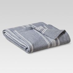 a blue and white towel folded on top of each other