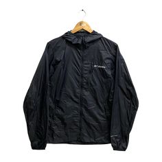 "Code : p/utc Vintage Columbia Windbreaker Men Black Jacket Large Columbia Usa Sportswear Company Jacket Sports Columbia Light Jacket Hoodie Embroidered  Size on Tag :  S Details Measurement  Arm Pit to Arm Pit : 19\"inches Back Collar to Hem : 27\"inches Condition :  Great Vintage Condition(Used Clothing).No Holes And No Stain.Please refer pictures detail.‼️" Vintage Columbia Jacket, Waterproof Long Sleeve Hooded Jacket For Streetwear, Waterproof Long Sleeve Hooded Jacket For Outdoor Activities, Black Hooded Jacket For Outdoor Activities, Double-lined Hood, Black Waterproof Track Jacket For Sports, Waterproof Hooded Jacket For Outdoor Activities, Black Double-lined Hooded Jacket For Outdoor Activities, Black Waterproof Athleisure Outerwear, Hooded Nylon Track Jacket With Moisture-wicking