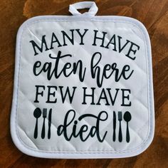 a pot holder with the words many have eaten here few have died