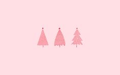 three pink christmas trees on a pink background