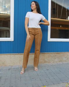 Suede trousers in brown. Low rise. Partially lined. Zipper. Contrasting white stitching. Extra long leg. UK 12 / EU 40. Measurements - 30"(76cm) waist - 38"(97cm) hips - 32"(82cm) leg length - 8.5"(29cm) rise. Material - Real suede. Condition - Excellent. Handpicked, repaired and ready to wear. This is an original vintage item, not new and minor signs of wear & age are expected, we will highlight any major flaws. Model is a UK 6/8 and is 5'7" tall. Suede Trousers, Jumpsuit Skirt, Sleeveless Jacket, Long Legs, Coat Dress, Playsuit Jumpsuit, Extra Long, Trousers Women, Low Rise