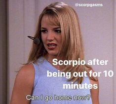 a woman in a blue top with a microphone on her head and the caption scorpio after being out for 10 minutes can i go home now?